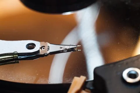 Disassembled hard drive from the computer, hdd with mirror effect Opened hard Stock Photos