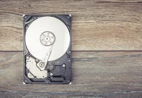 Disassembled Hard drive on the table Stock Photos