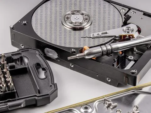 Disassembled hard drive.Open disk. Stock Photos