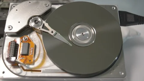 Disassembled hdd reading head. Hard disk drive initialization. Stock-Footage 107549435