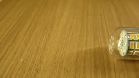 The disassembled LED corn lamp is on the table. Base E27 Stock-Footage 132314309