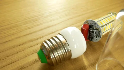 The disassembled LED corn lamp is on the table. Base E27 Stock-Footage 132314747