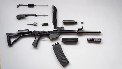 Disassembled machine gun Stock Footage 128572559