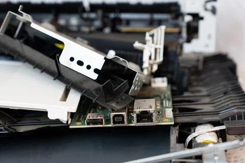Disassembled office printer during maintenance and repair Stockfoto's