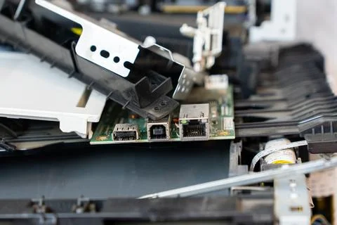 Disassembled office printer during maintenance and repair Stockfoto's