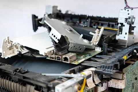 Disassembled office printer during maintenance and repair Stockfoto's