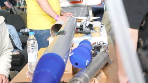 Disassembled plastic rocket mechanism with electronics Stock Footage 297852388