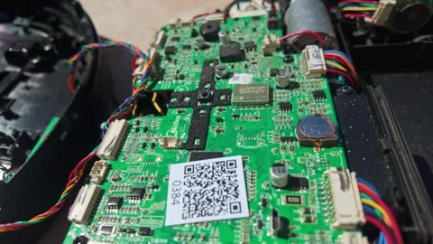 Disassembled Samsung Powerbot vacuum shows exposed components during repair Stock Footage 336505302