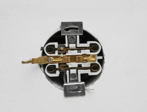 Disassembled socket on white background, closeup. Electrician's equipment Stock Photos