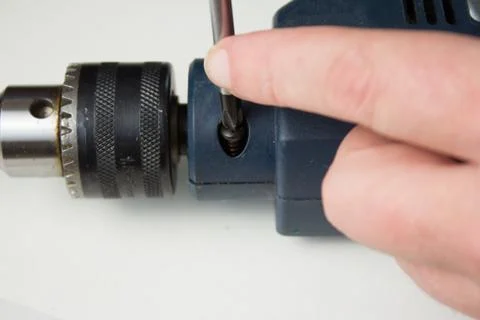 Disassembles a hand held electric drill on a white background 스톡 사진