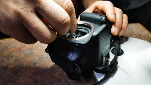 Disassembling and repairing of digital reflex camera Stock Photos