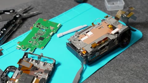 Disassembling camera for electronic repair and maintenance. Stock Footage 336213703