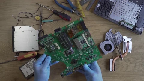 Disassembling the computer board Stock Footage 134507461