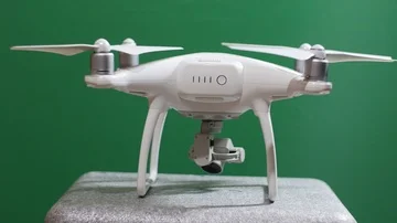 Disassembling A Drone After A Flight On Green Screen Background Stock Footage 85853343