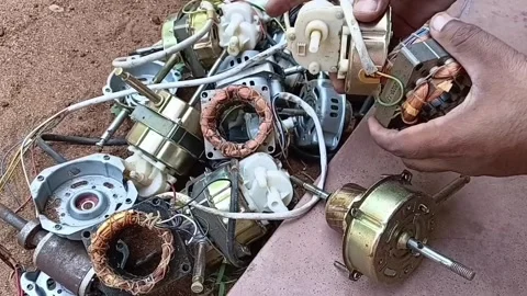 Disassembling Electric Fan Motor Separating Metal Parts Vídeo Stock 339305620