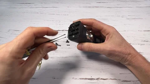 Disassembling an electric shaver beard and replacing batteries - step 2 of 10 Stock Footage 327304950