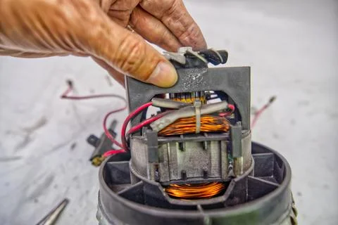 Disassembling a Household Vacuum Cleaner Stock Photos