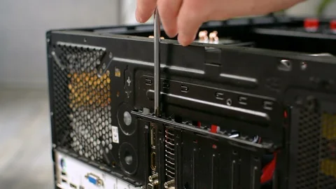 Disassembling PC personal computer case by unmounting rear back rail closeup 库存影片 91225074