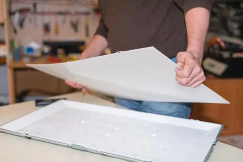 Disassembling the screen for repair of LED backlight on LCD TV Stock Photos