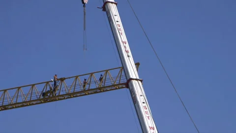 Disassembly of part of a crane on construction site, time-lapse. Stock Footage 145793490