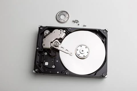 Disassembly process of an external hard drive in details Stock Photos
