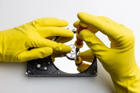 Disassembly process of an external hard drive in details Stock Photos