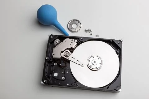 Disassembly process of an external hard drive in details Stock Photos