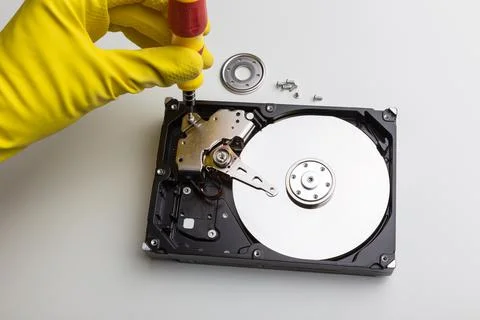Disassembly process of an external hard drive in details Stock Photos