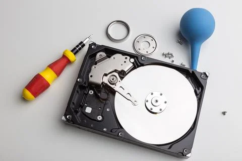 Disassembly process of an external hard drive in details Stock Photos