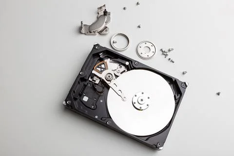 Disassembly process of an external hard drive in details Stock Photos