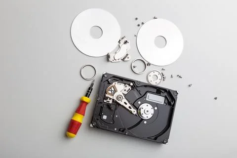 Disassembly process of an external hard drive in details Stock Photos