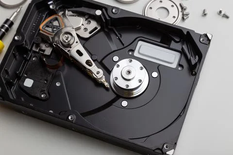 Disassembly process of an external hard drive in details Stock Photos