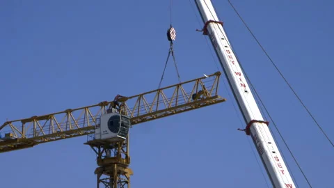 Disassembly of a tower crane component on construction site, time-lapse. Stock Footage 145793447