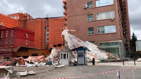 Disaster area construction crush storm wind aftermath Stock Footage 106985176