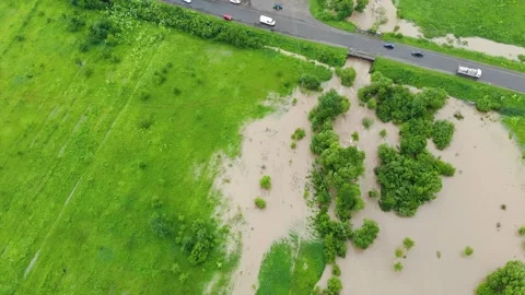 Disaster. Cataclysm. Catastrophe.Fast flowing raging river. Stock Footage 133451780