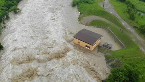 Disaster. Cataclysm. Catastrophe.Fast flowing raging river.Swollen boiling Stock Footage 133452133