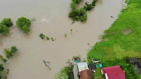Disaster. Cataclysm. Catastrophe.Fast flowing raging river.After strong rain Stock Footage 133453419