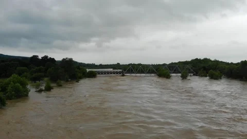 Disaster.After strong rain. Giant roiling brown muddy water. Stock Footage 133451606