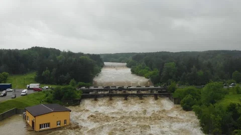 Disaster.Breakthrough of the dam.Catastrophe.Fast flowing raging river. Stock Footage 133449984