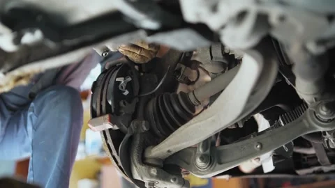 The disc brake of the car is being repaired, in the process of being replaced Stock Footage 333721462