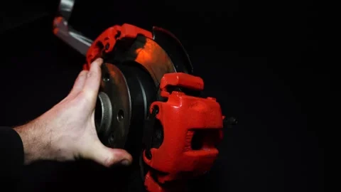 Disc brakes with two red calipers for hydraulic handbrake Stock Footage 302959618