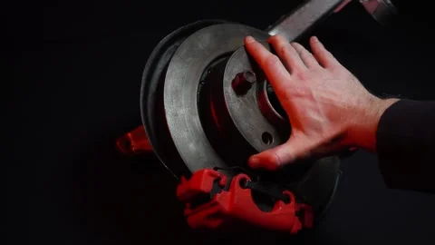 Disc brakes with two red calipers for hydraulic handbrake Stock Footage 302959708