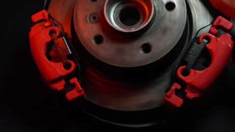 Disc brakes with two red calipers for hydraulic handbrake Stock Footage 302959722