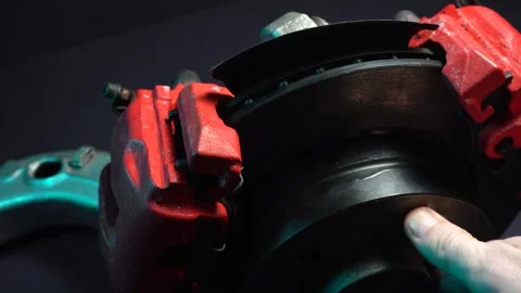 Disc brakes with two red calipers for hydraulic handbrake Stock Footage 302959725