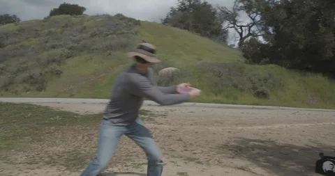 Disc golf drive on tee pad Stock Footage 104460141