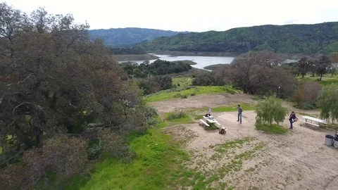 Disc golf drive off Top of the World, Lake Casitas Video stock 104460012