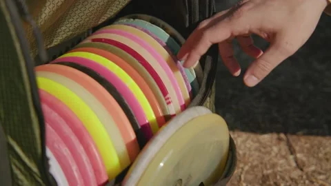 Disc Golf Picking a Disc Out of the Bag. Stock Footage 170013251
