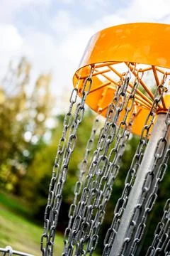 Disc golf target in a forest clearing. Stock Photos
