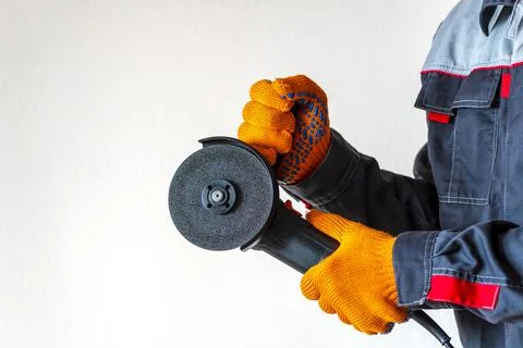 Disc grinder. Grinder in the hand. Close-up. Copy space 写真素材