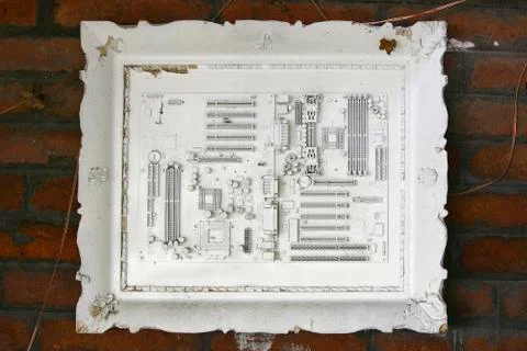 Discarded computer board painted in white on frame Fotos Stock